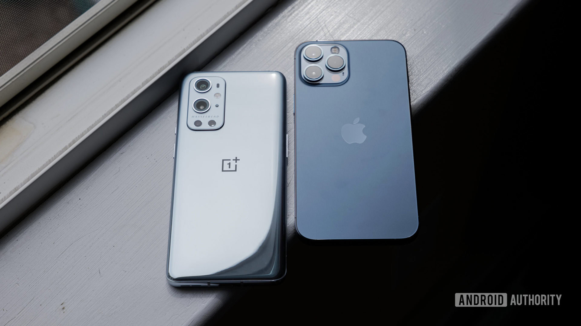 OnePlus 9 Pro vs iPhone 12 Pro Max on windowsill