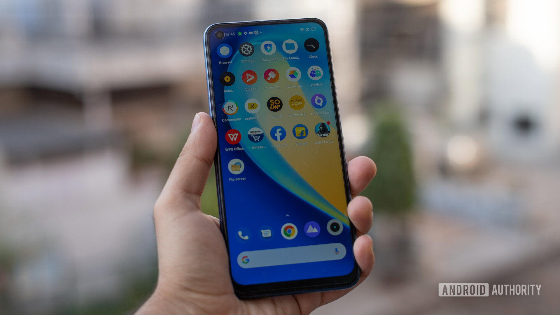 realme Narzo 30 Pro review in hand showing display