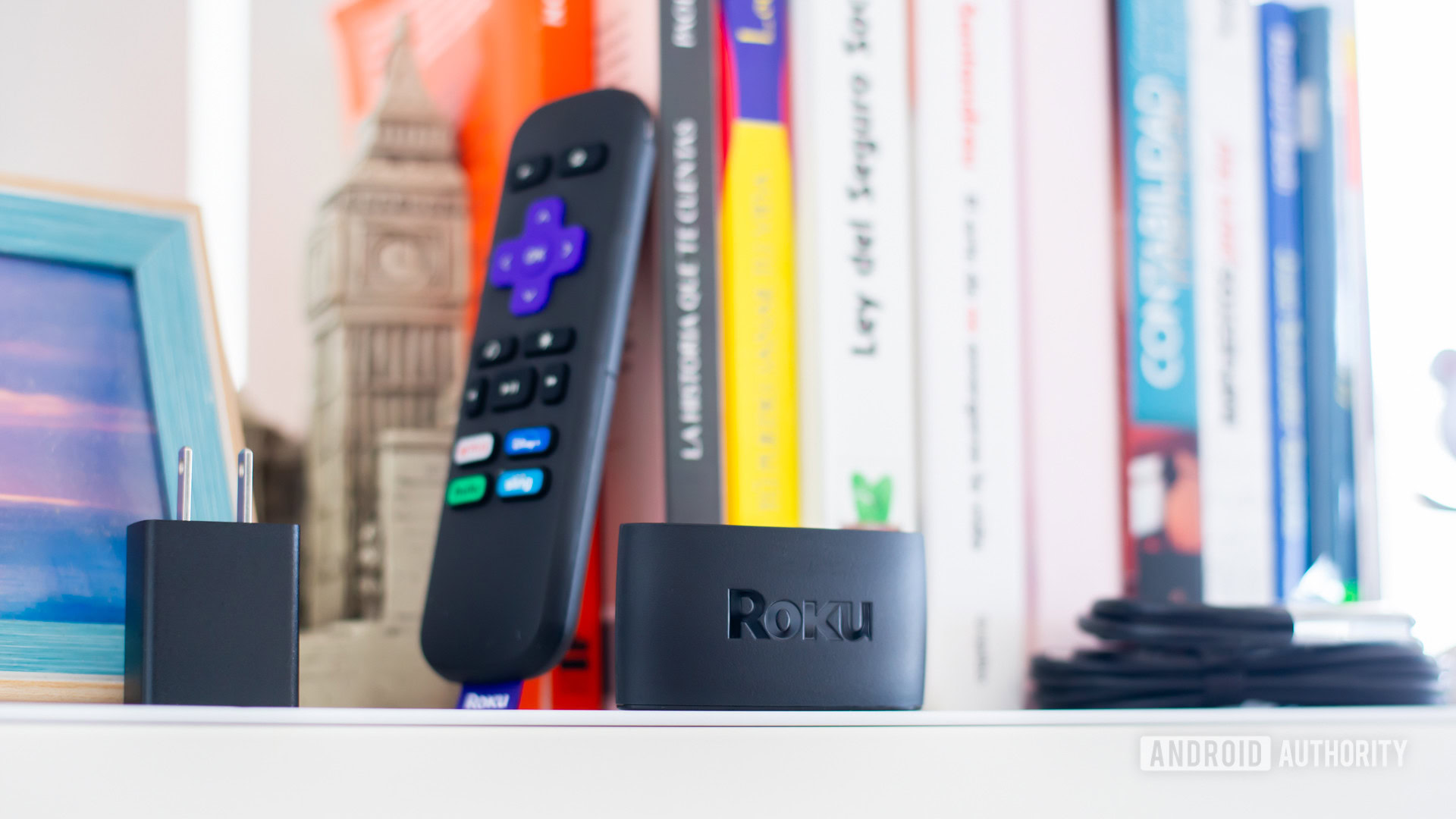 Roku Express on bookshelf - Disney Plus on Roku