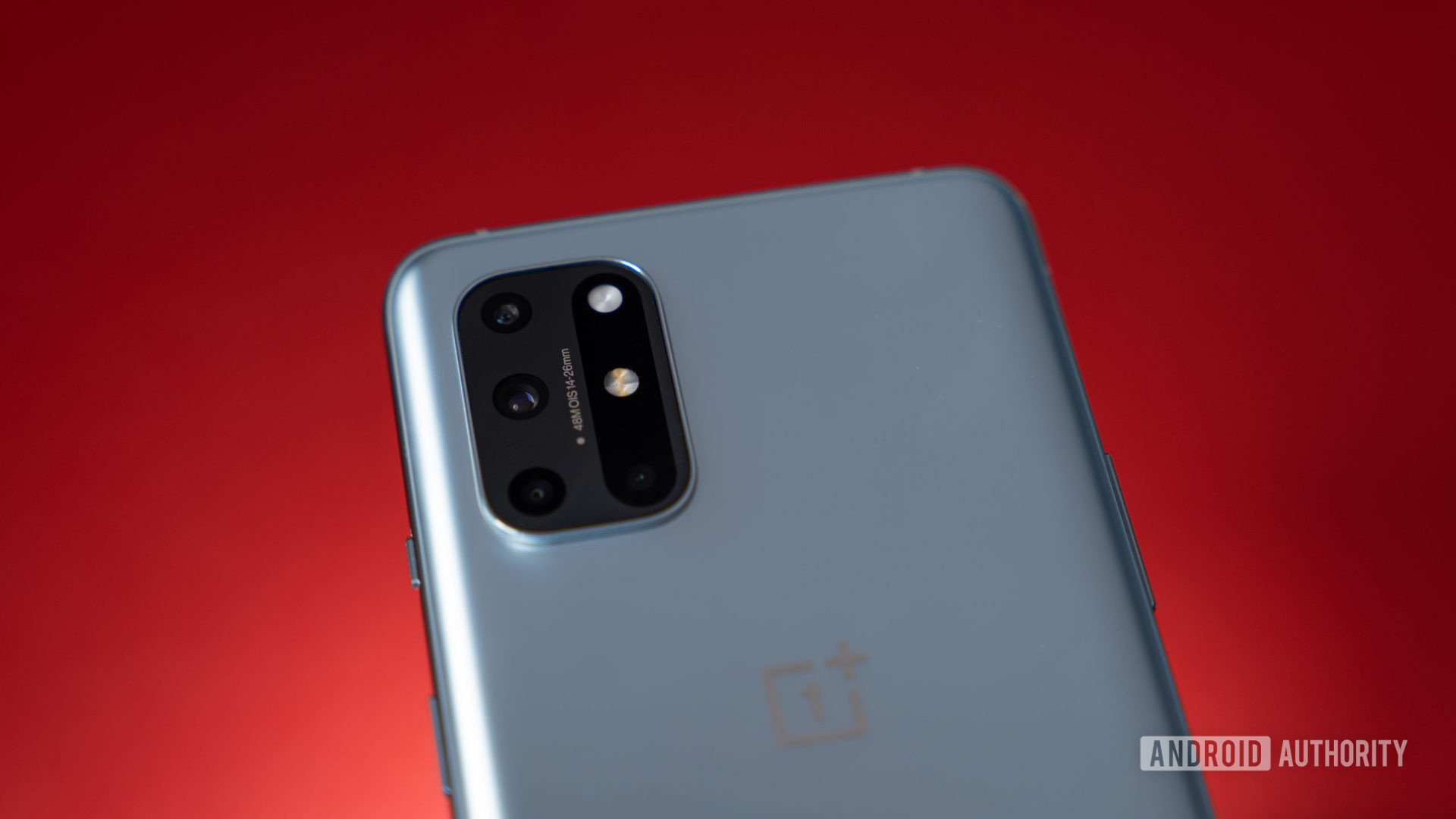 OnePlus 8T Cameras on Red Background