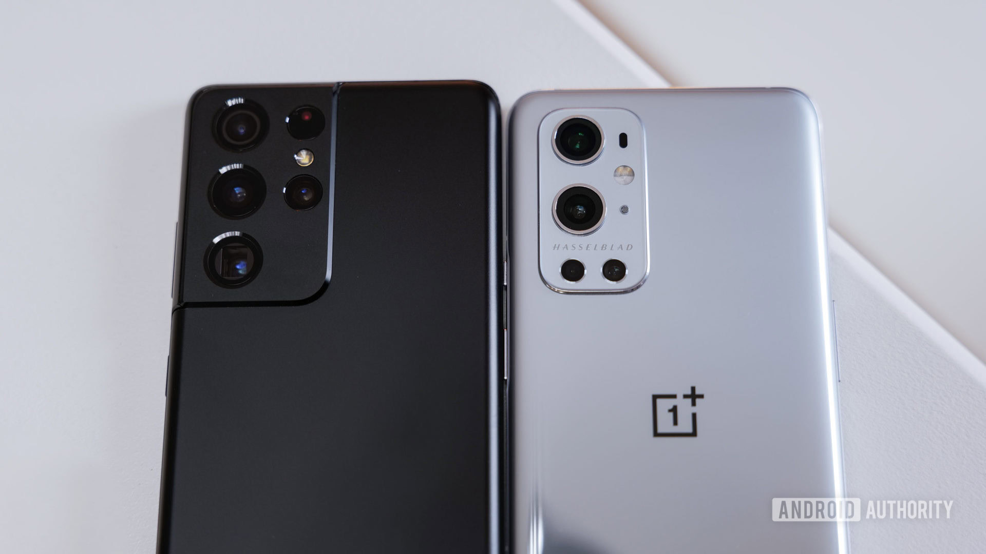 OnePlus 9 Pro vs Samsung Galaxy S21 Ultra on white table