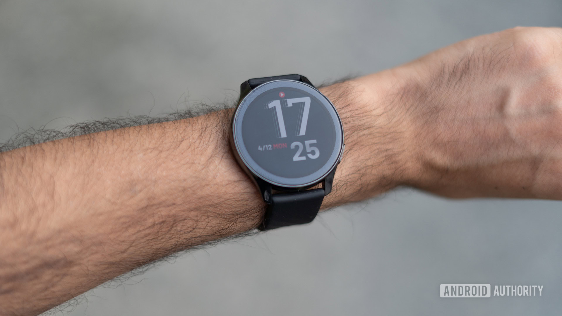 OnePlus Watch on wrist with watchface