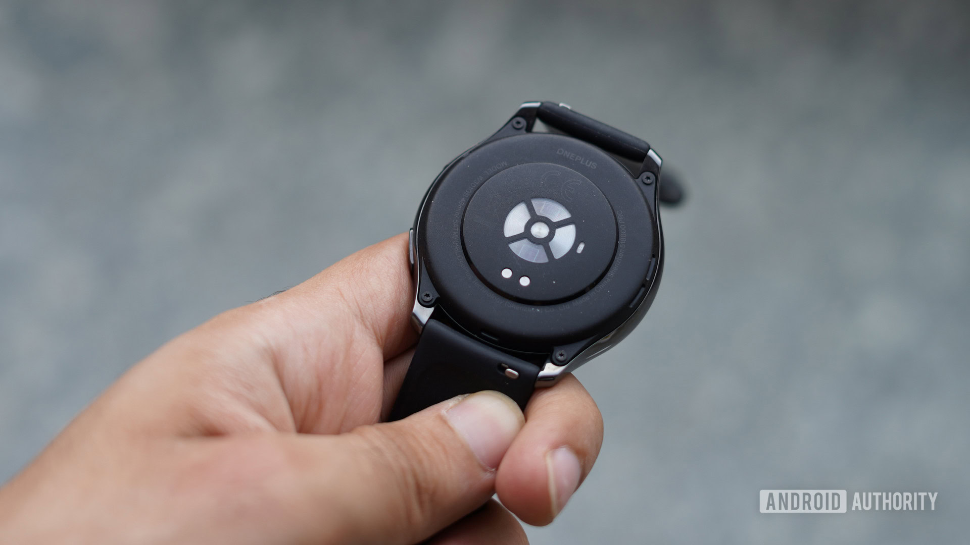 OnePlus Watch showing rear sensors