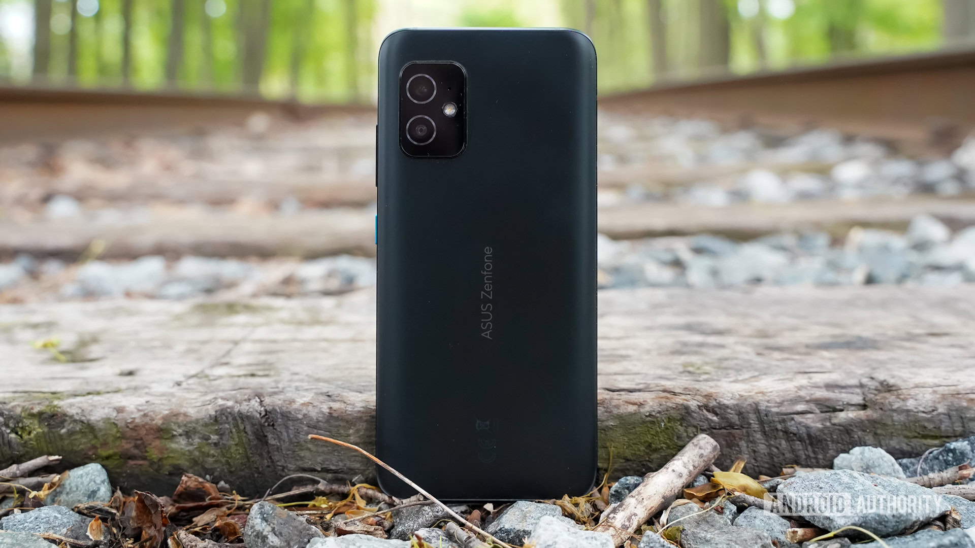 ASUS Zenfone 8 rear standing on tracks