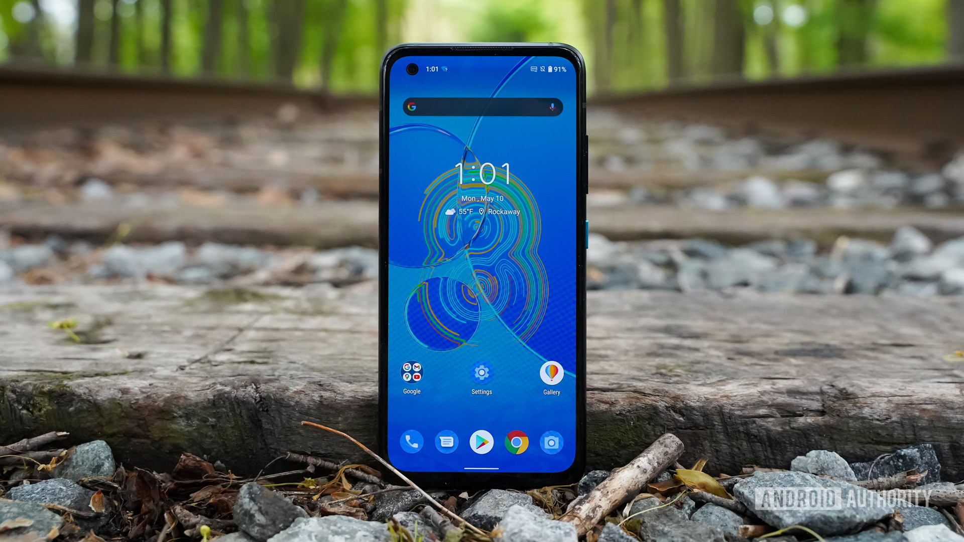 ASUS Zenfone 8 standing on tracks