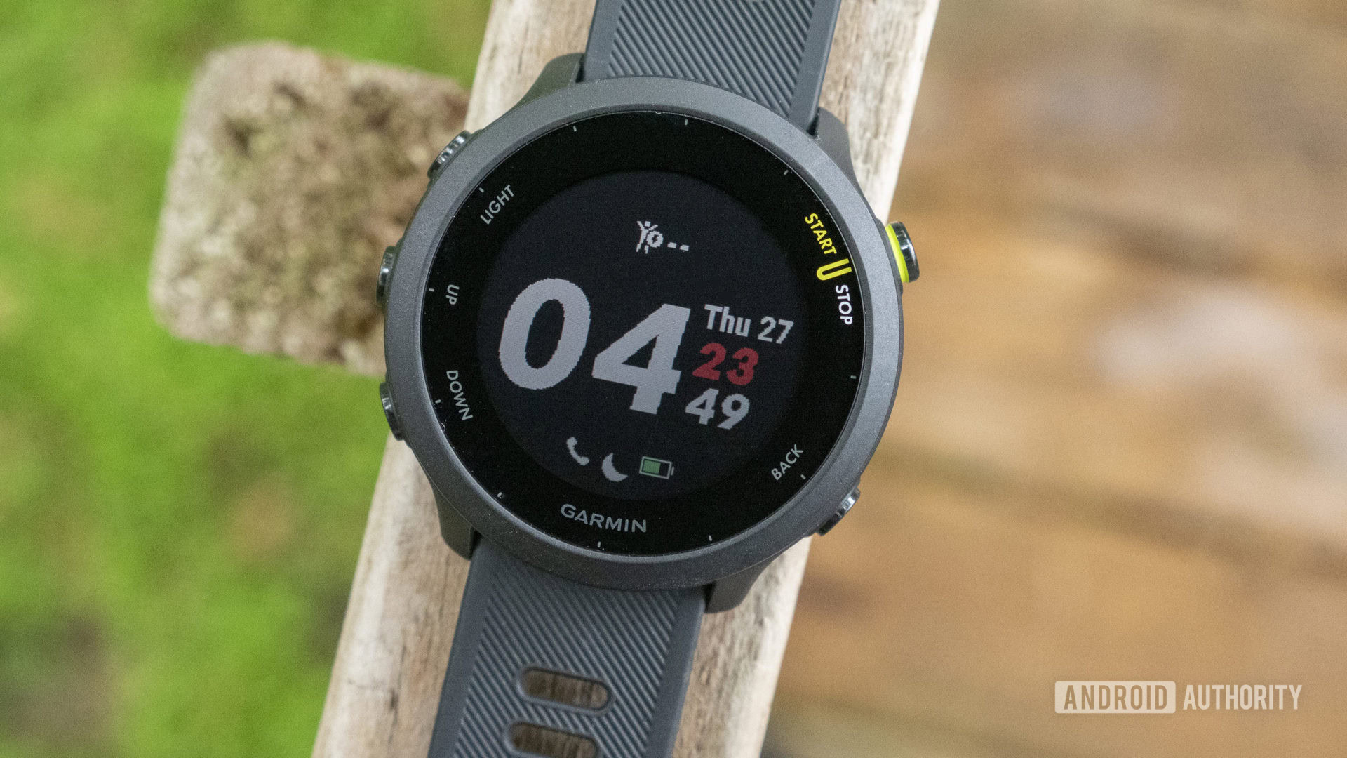 Garmin Forerunner 55 review watch face display on table 2