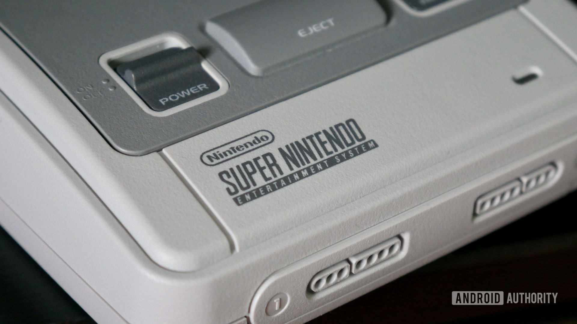 super nintendo snes console showing a closeup of the logo