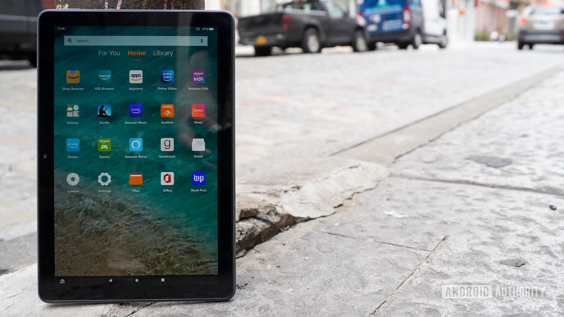 Amazon Fire HD 10 Plus standing on the street