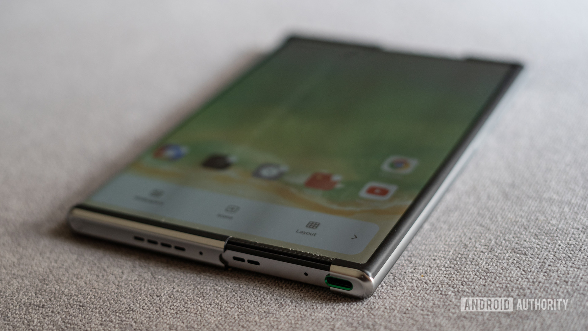 OPPO Rollable Phone Concept lower profile showing dust
