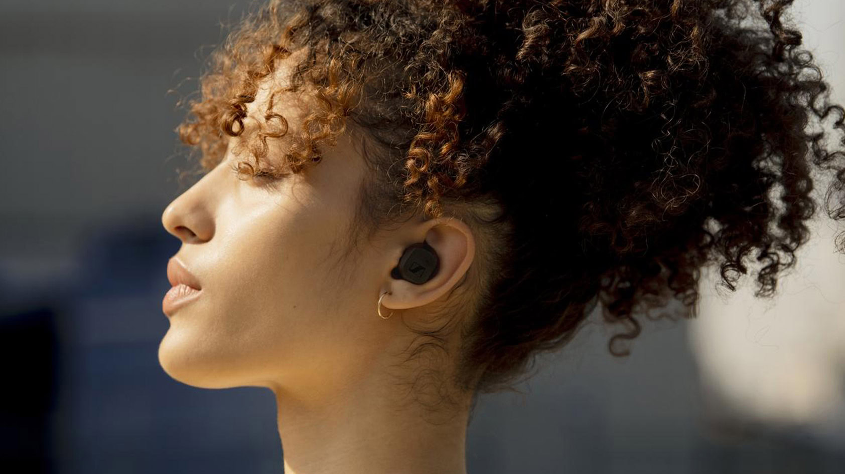 Sennheiser CX true wireless earbuds woman wears