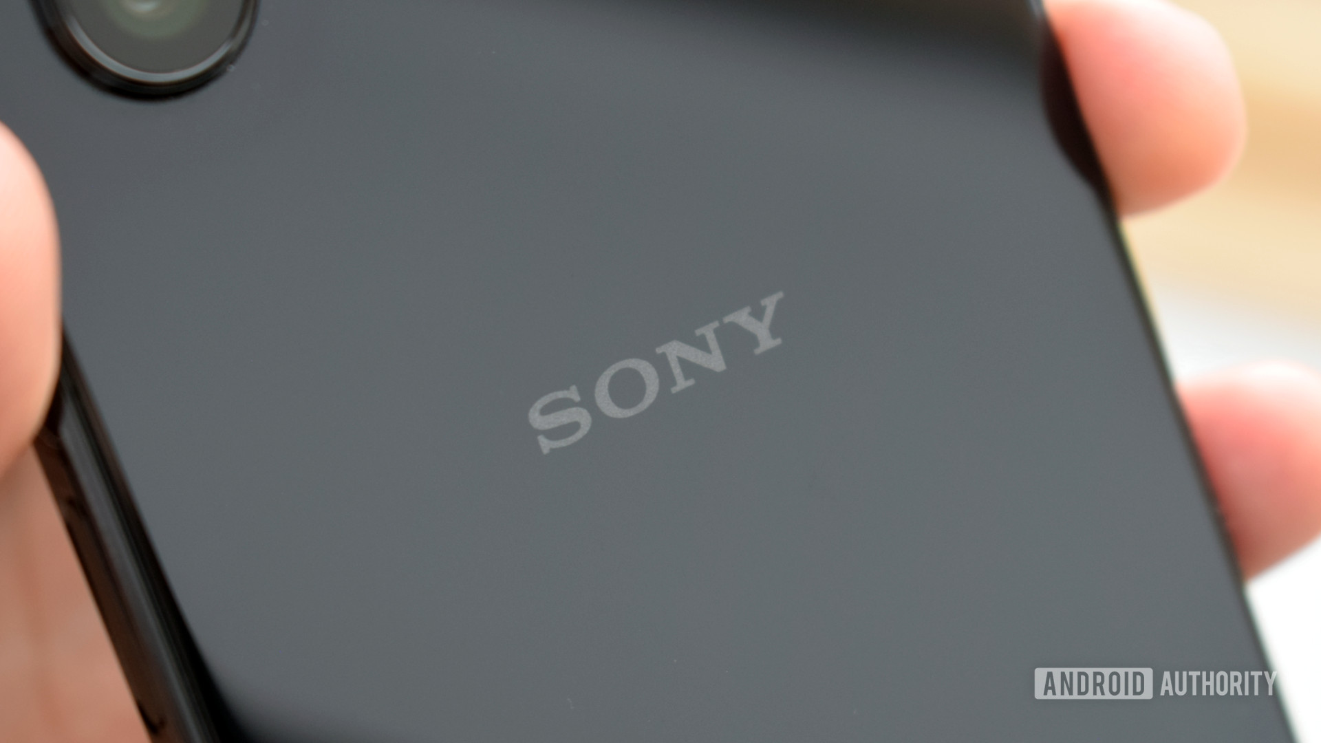 The Sony Xperia 1 II in hand, rear view showing the Sony logo.