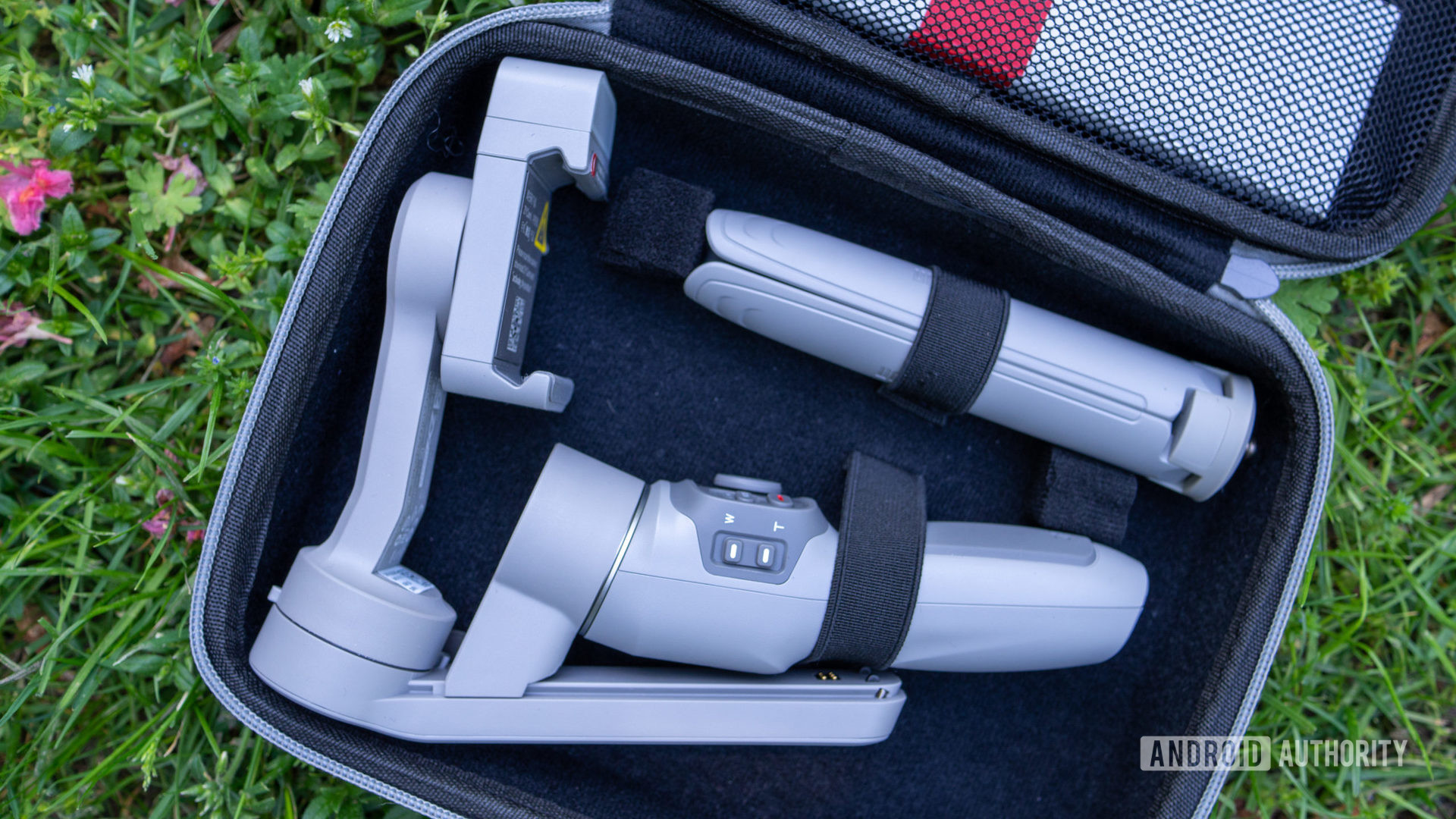 The Zhiyun Smooth-Q3 in carrying case with tripod.