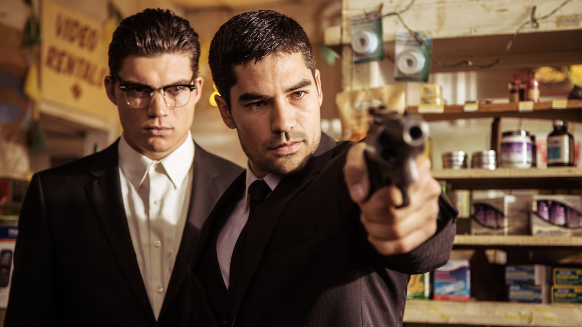 Zane Holtz and D.J. Cotrona hold up a store in From Dusk Till Dawn: The Series - best westerns on Netflix