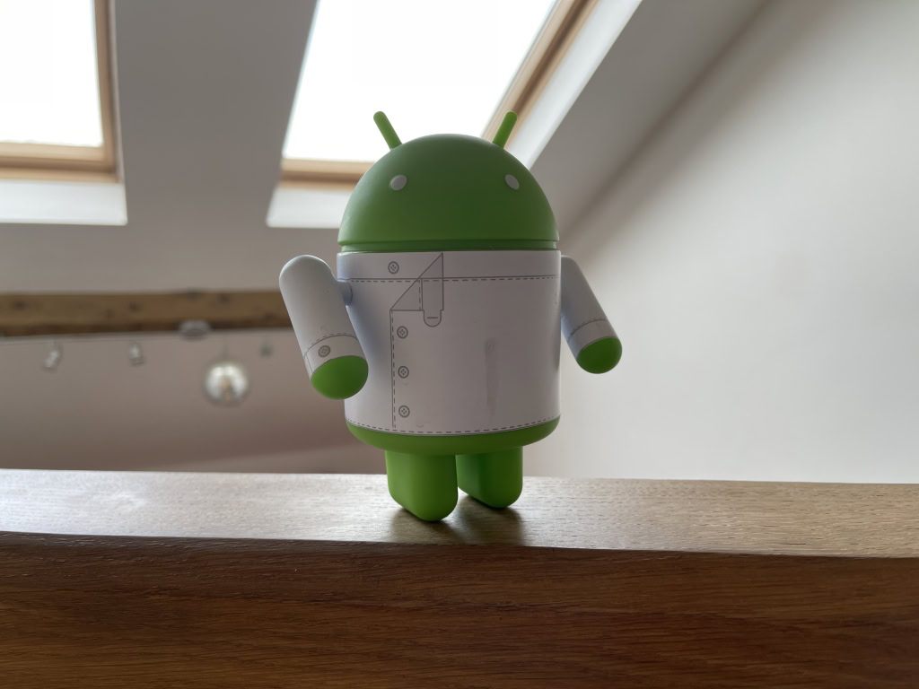HDR picture of Android figurine with skylight in the back Apple iPhone 12 Pro Max
