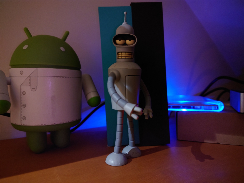 Android and Bender figurines in the dark taken on Sony Xperia 1 III