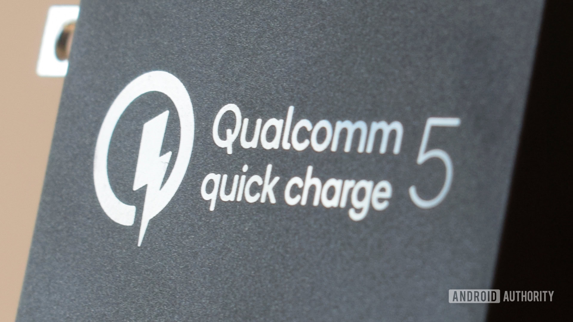 Qualcomm Quick Charge 5 text close up