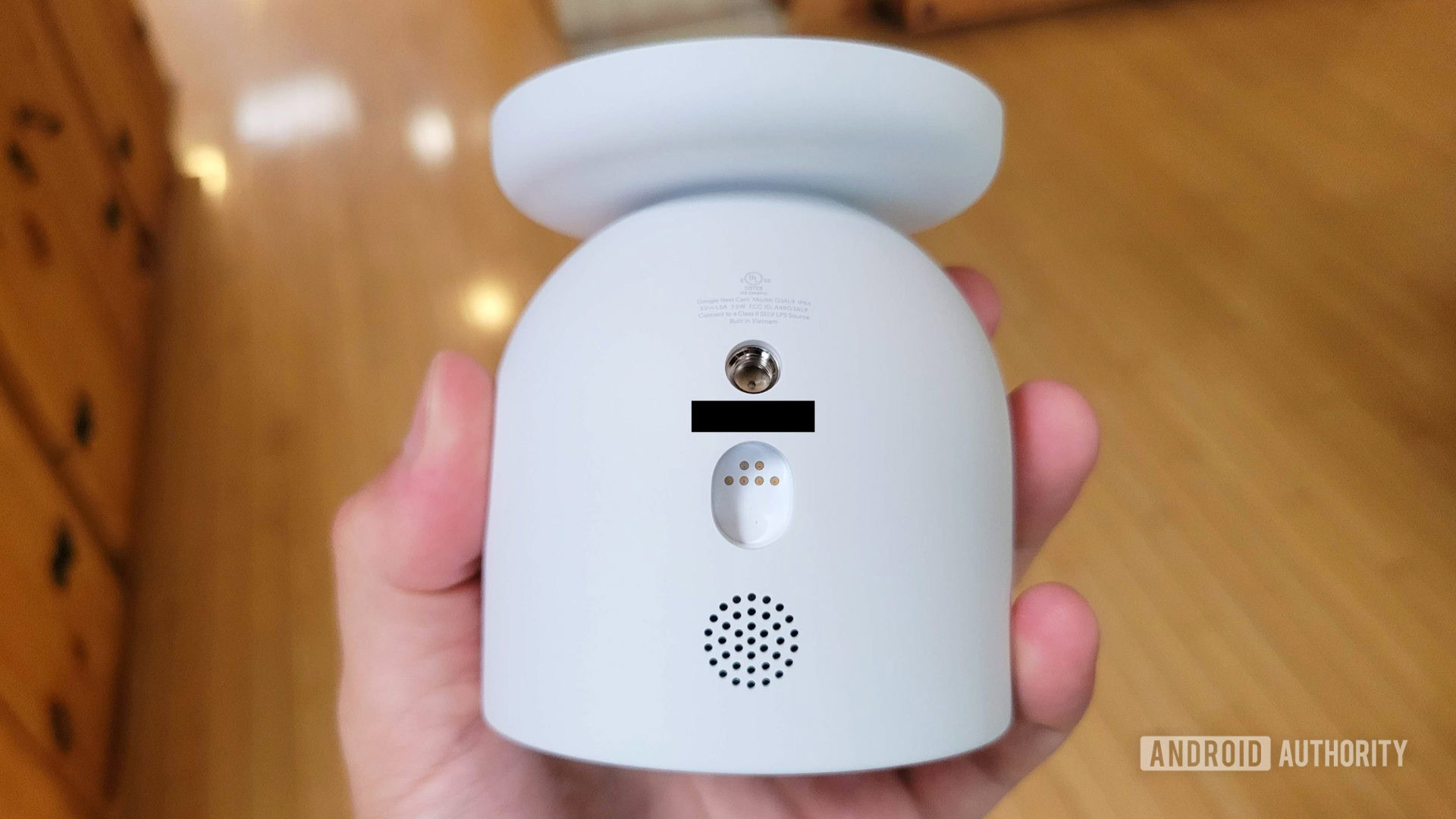 Google Nest Cam Review 2021 Bottom with Speaker Port and Power Connector