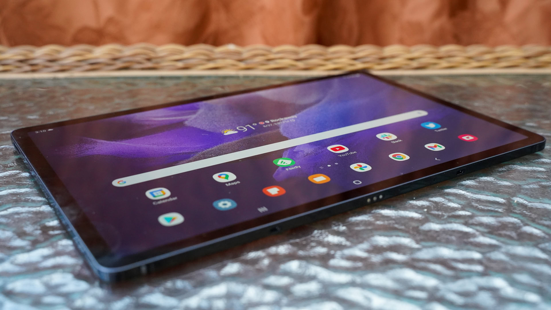 Samsung Galaxy Tab S7 FE laying at an angle