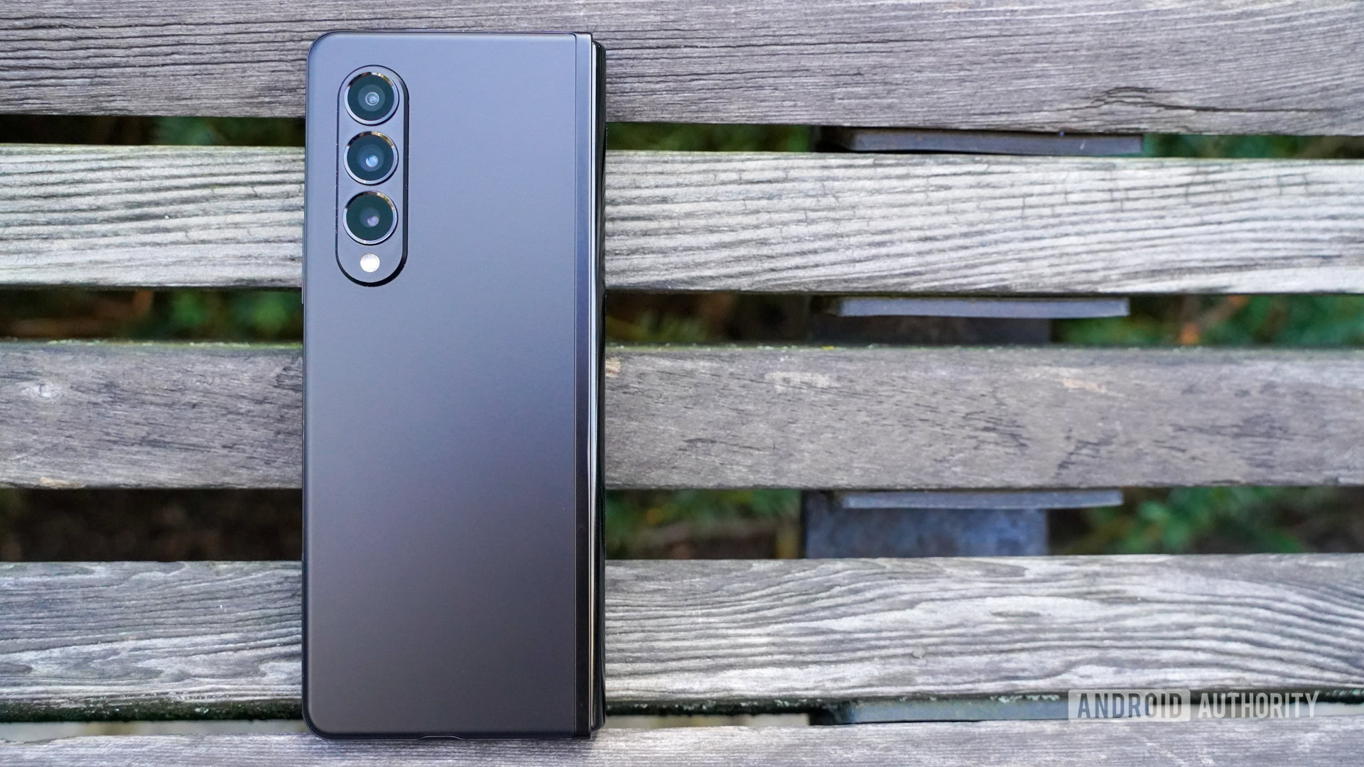 Samsung Galaxy Z Fold 3 camera rear on a bench.