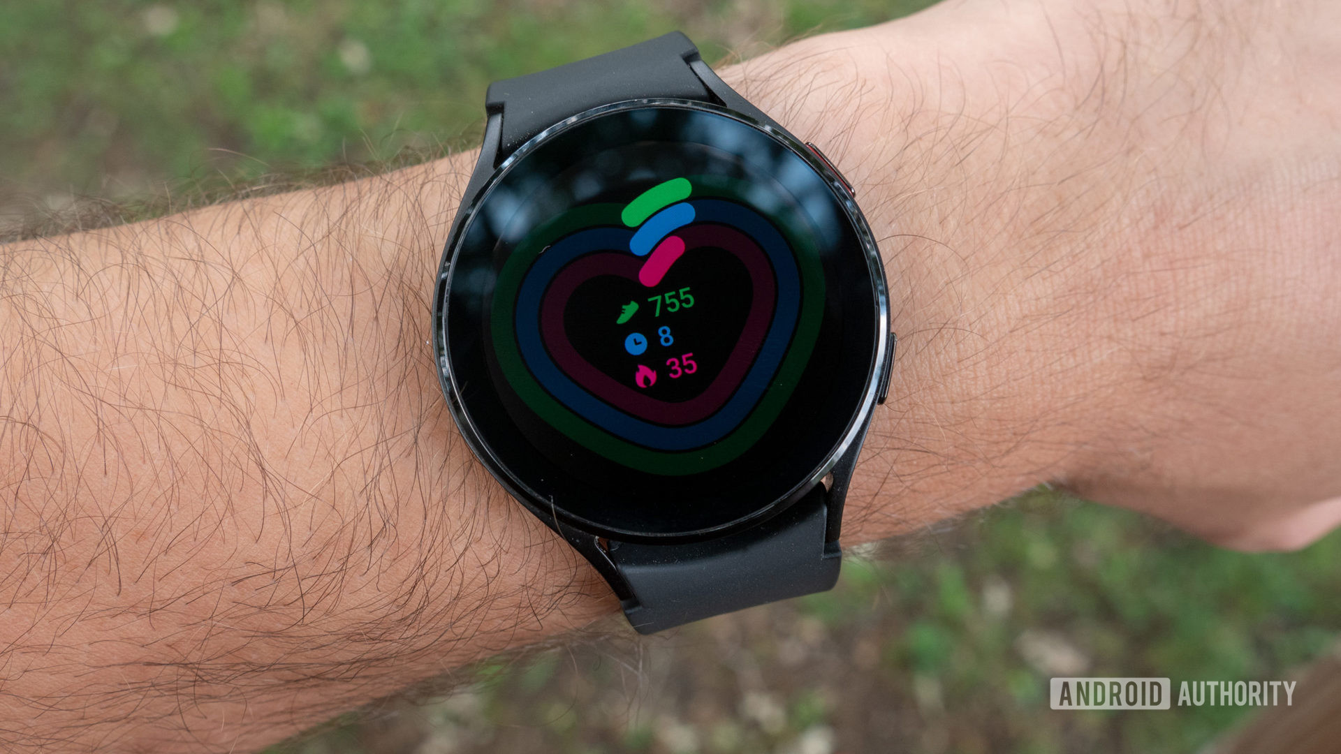 The Samsung Galaxy Watch 4 on a wrist showing daily activity.