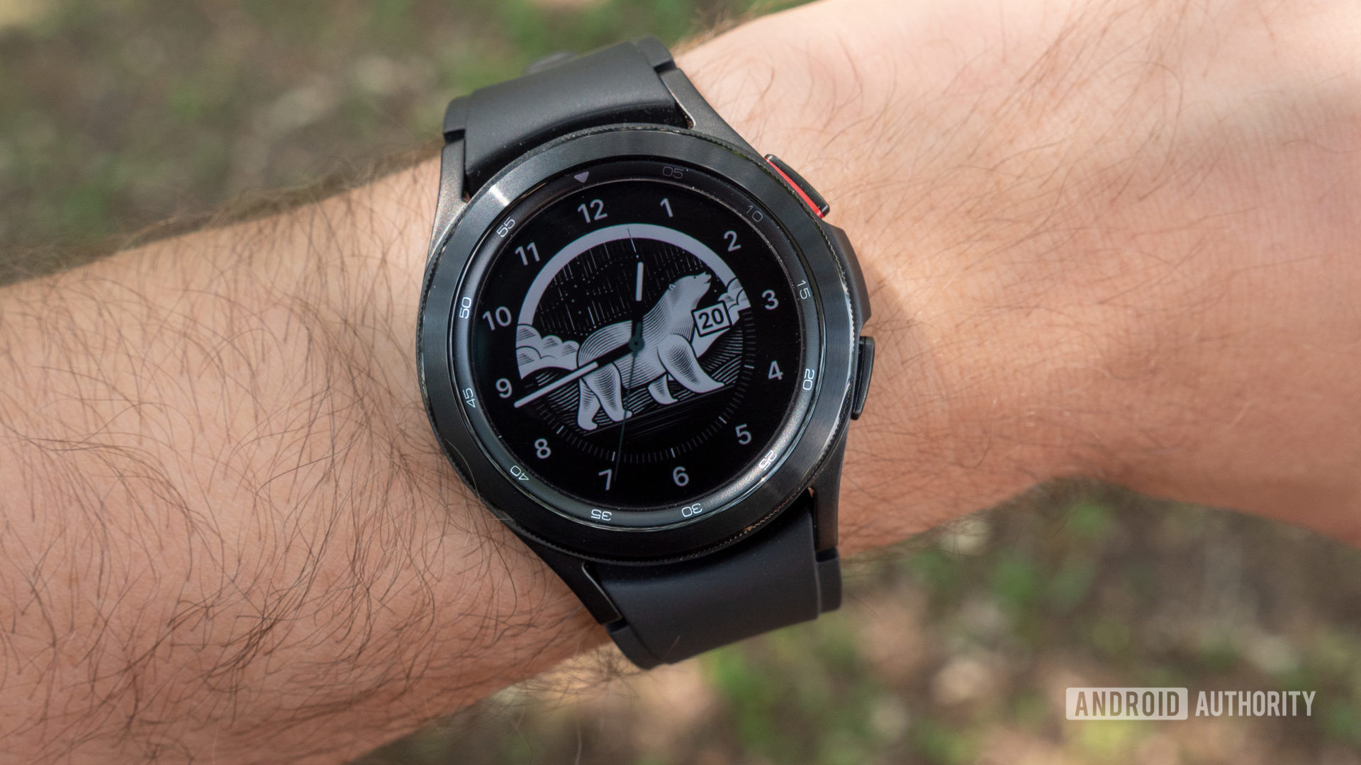 The Samsung Galaxy Watch 4 Classic on a wrist showing the watch face.