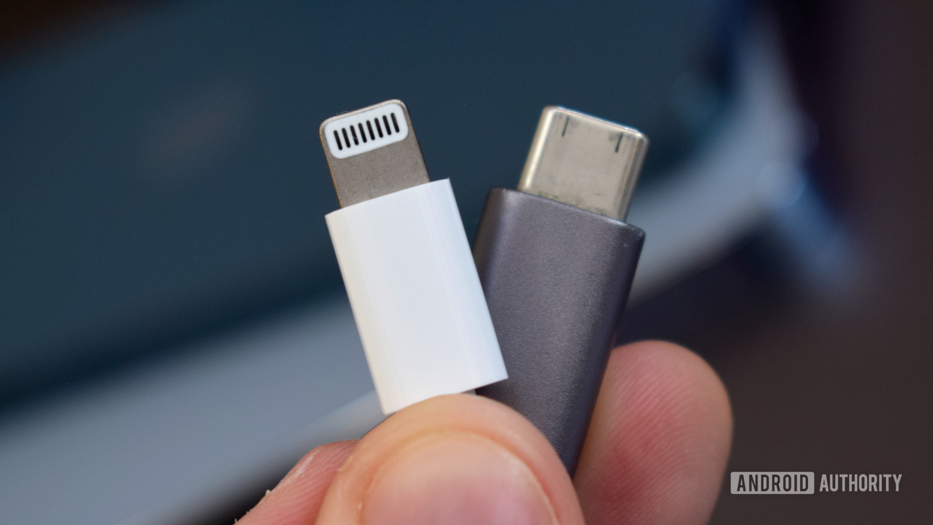 Lightning Connector vs USB C cable in hand