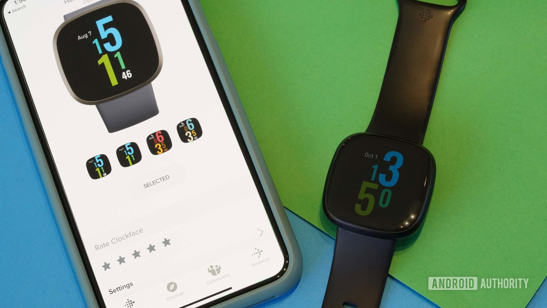 An iPhone 11 displays how to change the clock face on a Fitbit Versa 3. 