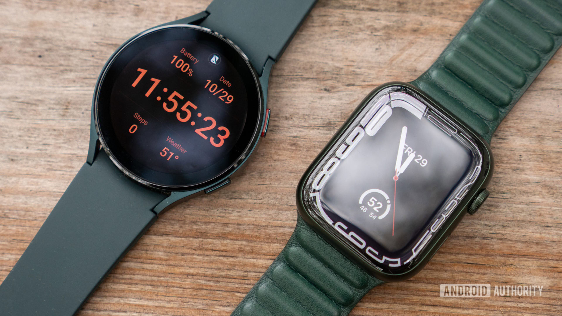 An Apple Watch Series 7 and Samsung Galaxy Watch 4 rest side by side, each displaying a watch face.