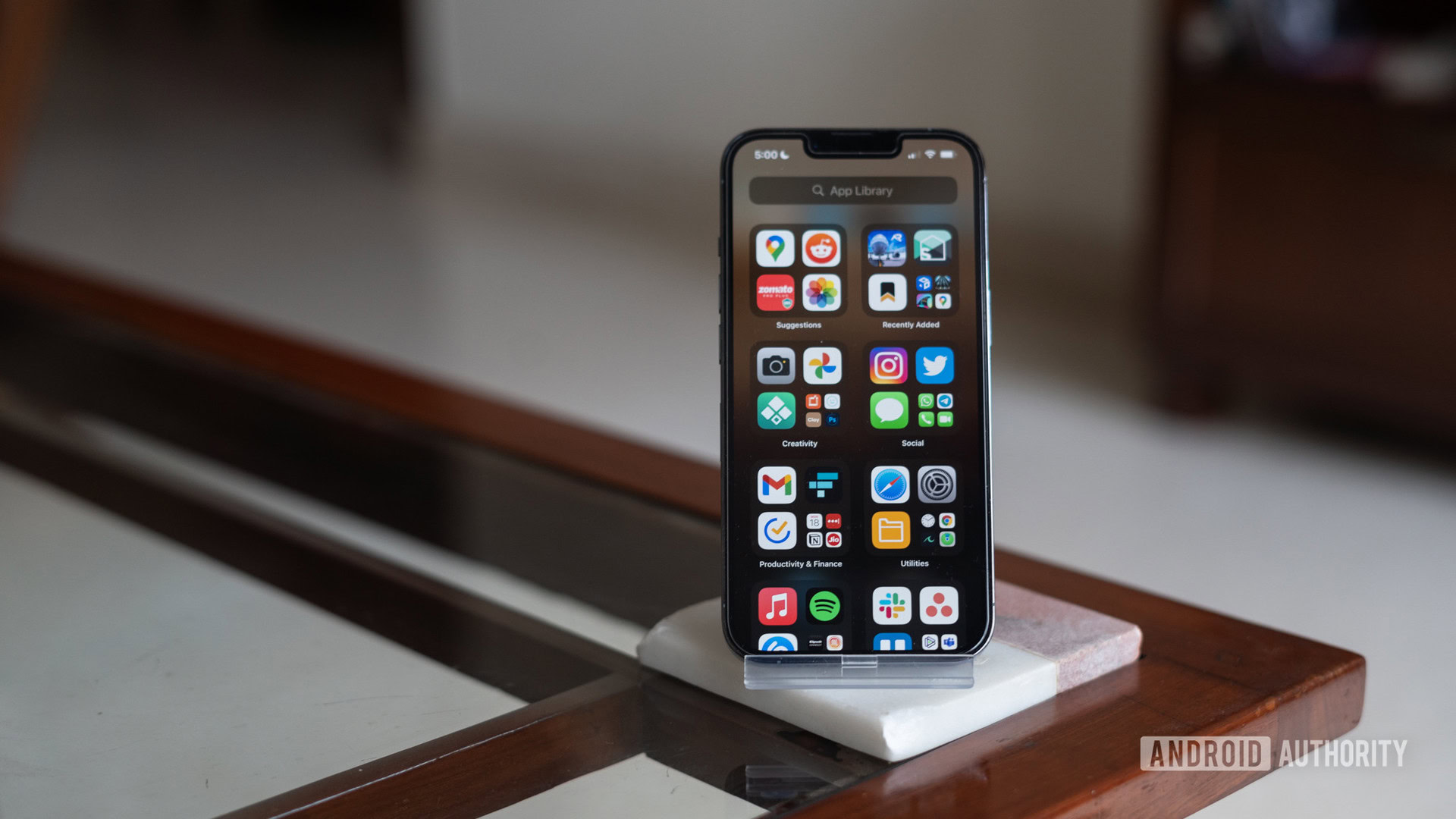 iPhone 13 Pro review standing up with display on — software as a service