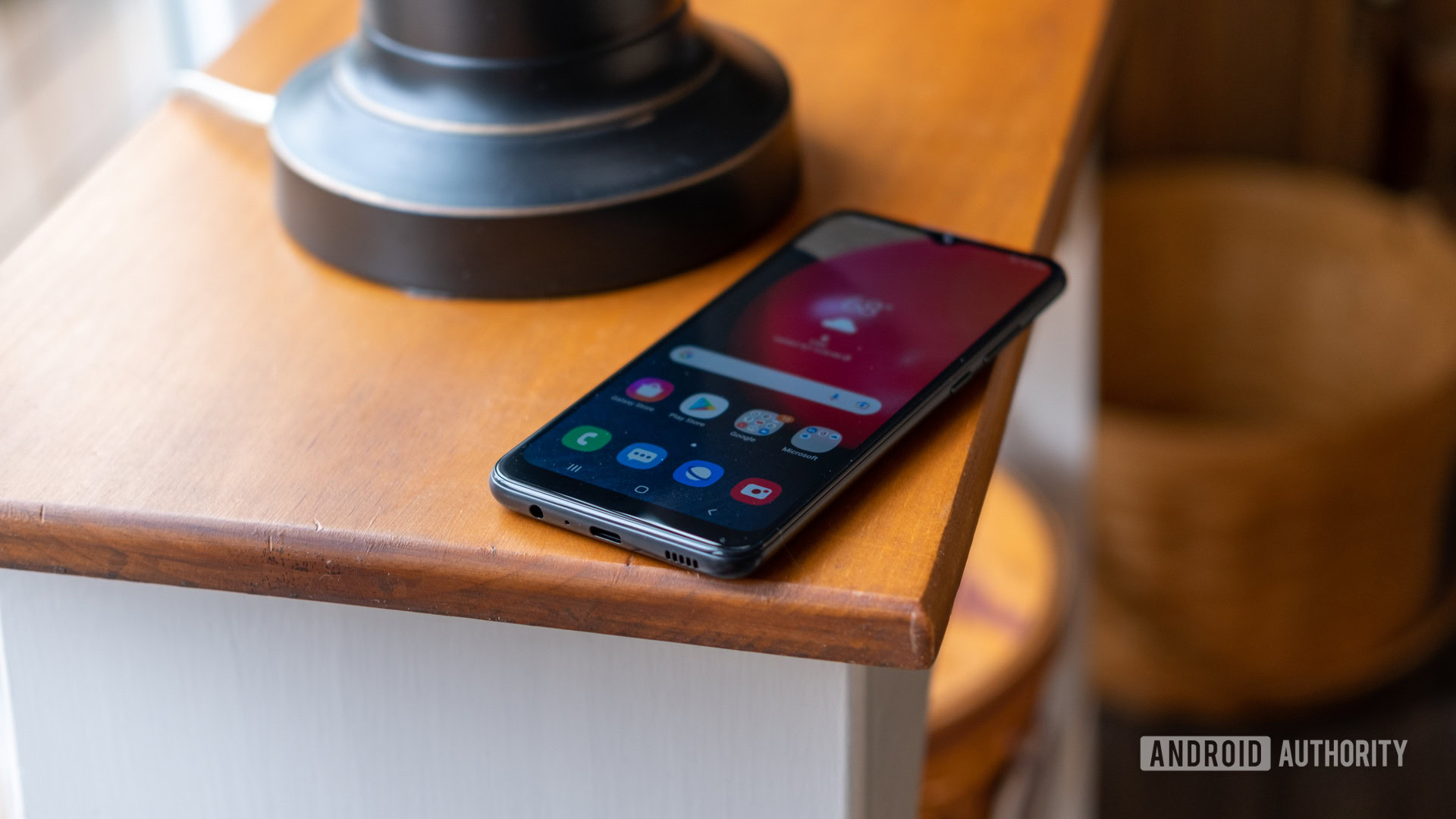 The Samsung Galaxy A02s on a table showing ports