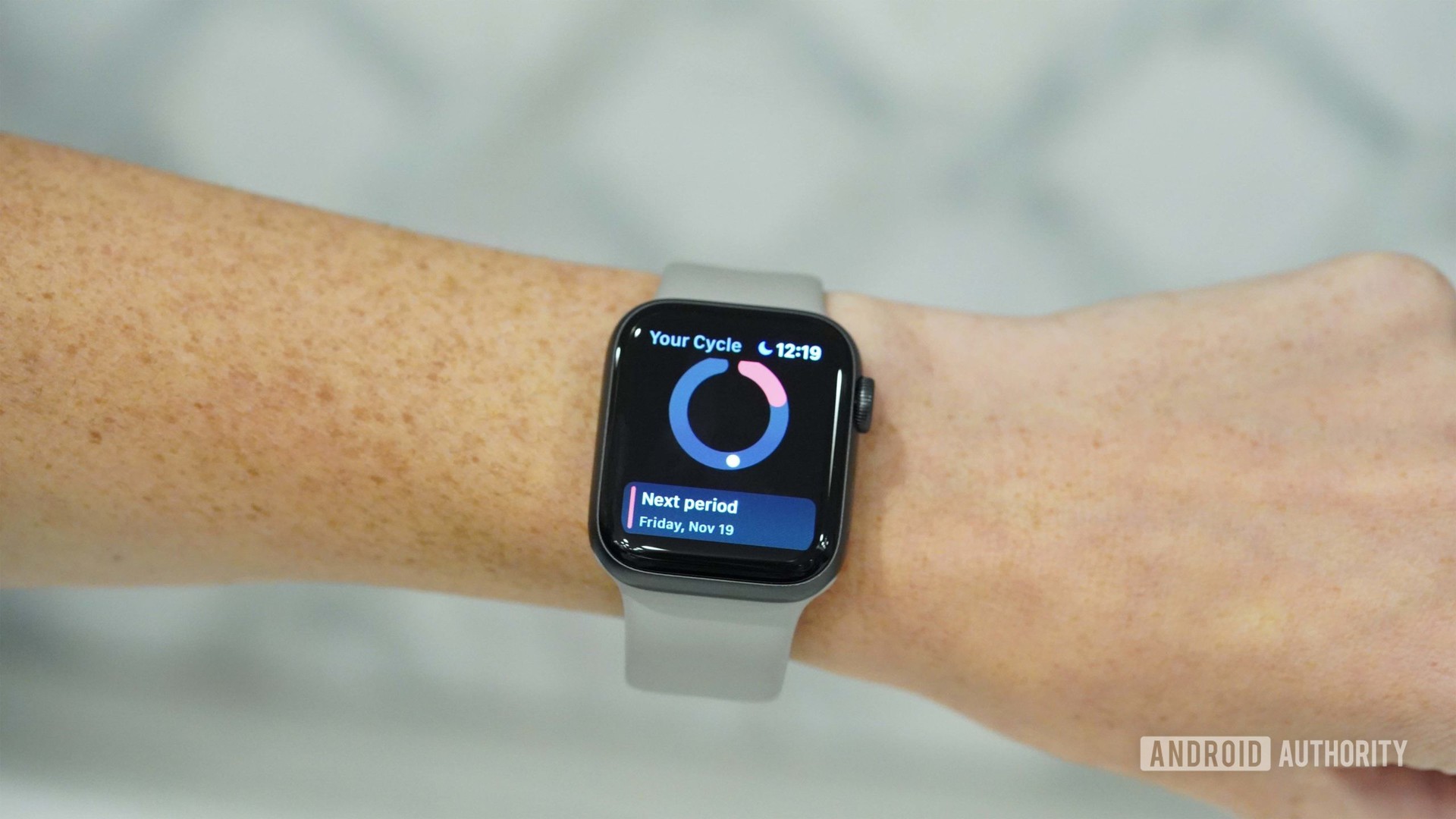 An Apple Watch Series 6 displays information about a users next period.