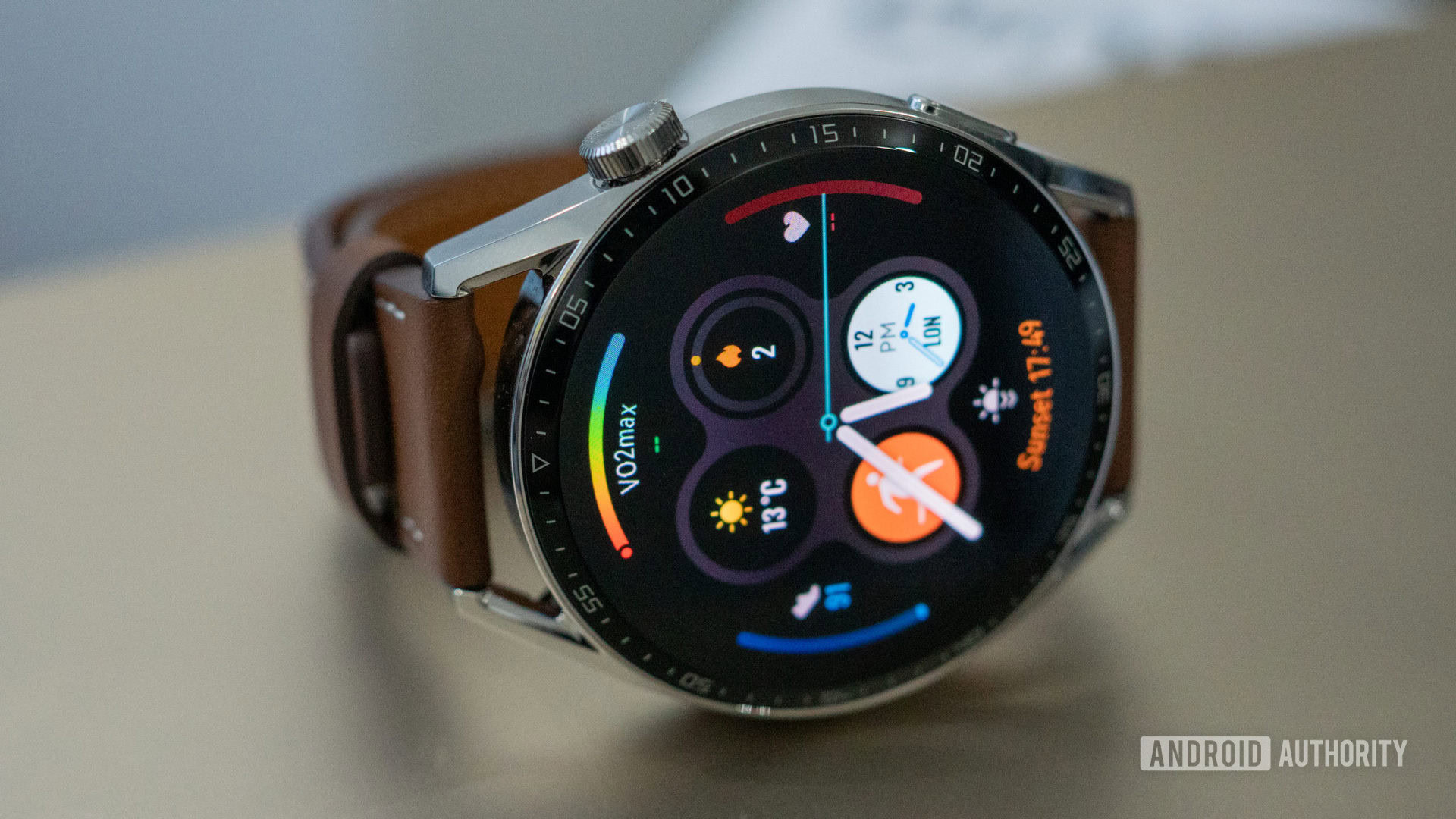 HUAWEI Watch GT 3 modern watch face laying on table