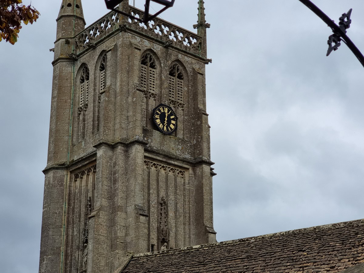 Zoom 3x shot of a church tower with a black and gold clock on the Samsung Galaxy S21 Ultra