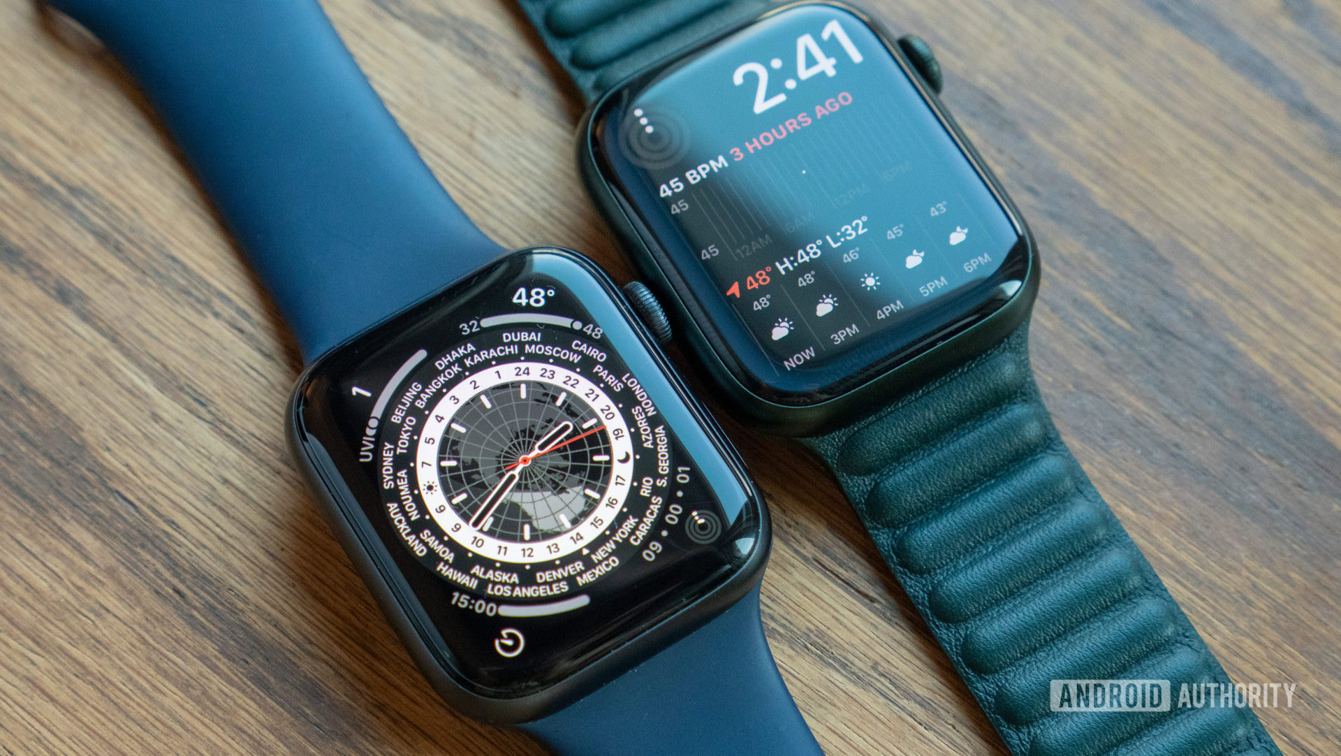 An Apple Watch Series 6 and Series 7 rest on a table side by side.