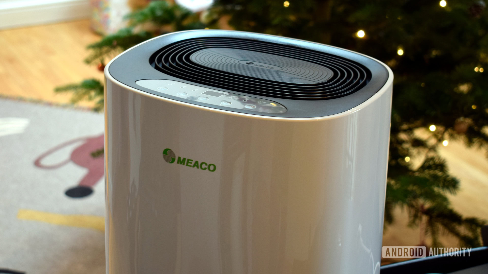 meaco abc 12l dehumidifer with a christmas tree in the background