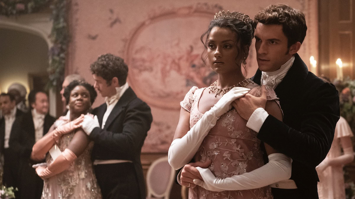 Simone Ashley and Jonathan Bailey dance at a ball in Bridgerton season 2