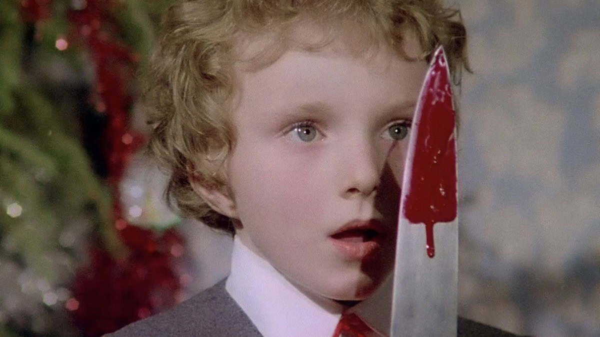 Little boy holding a bloody knife in Deep Red — best movies on shudder