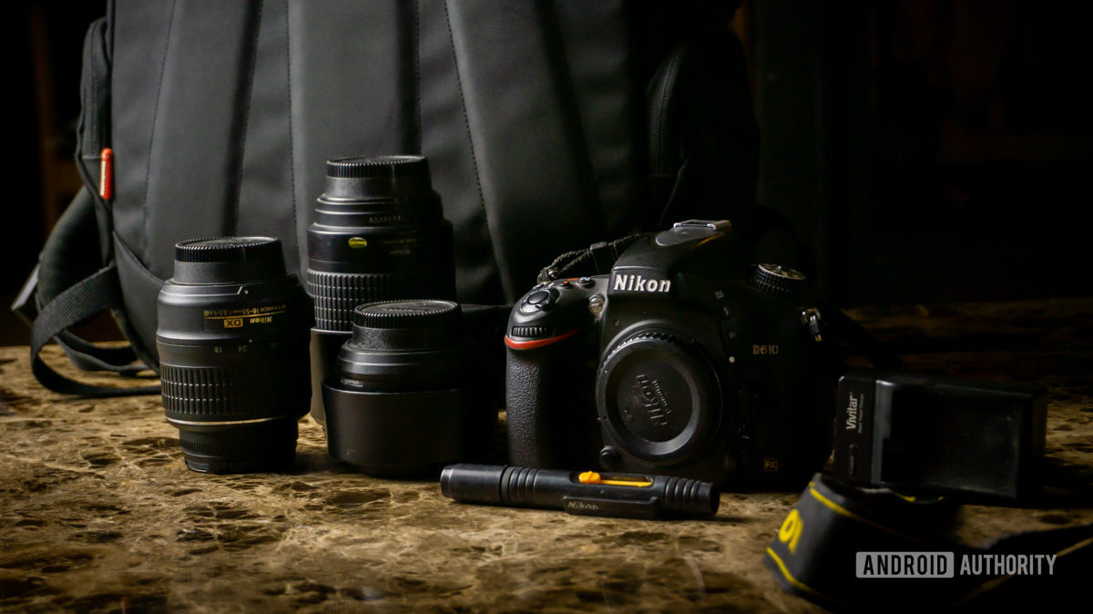 Nikon D610 DSLR camera qith lenses and other photo equipment