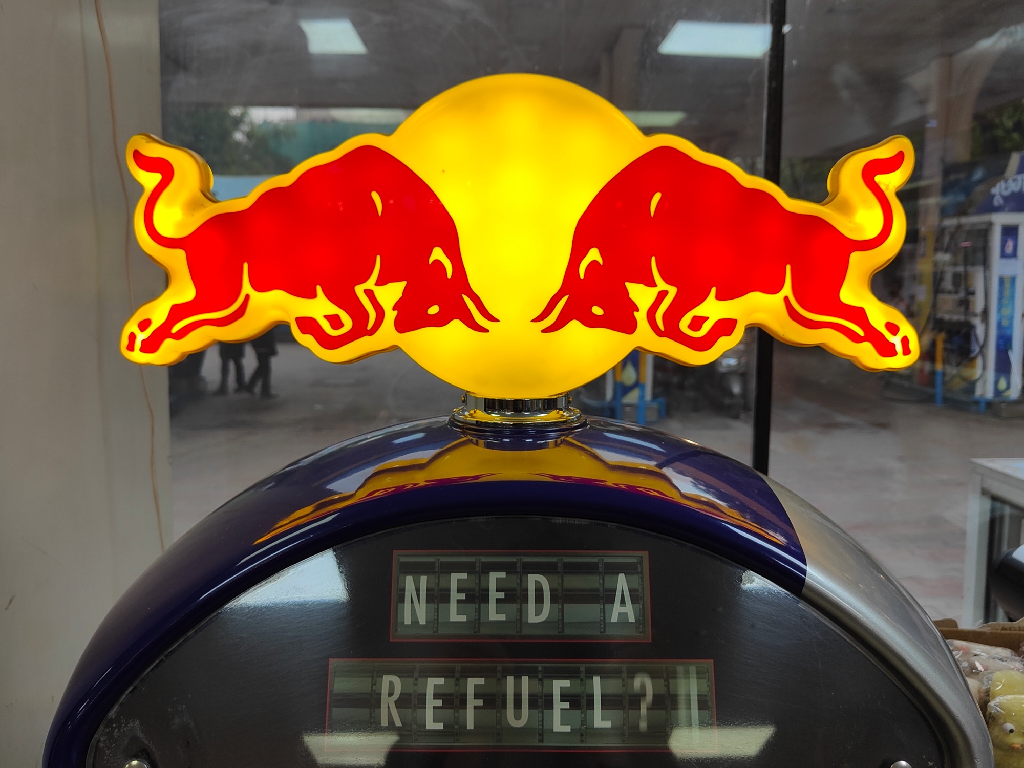 OnePlus 9RT primary camera dynamic range showing Red Bull sign.