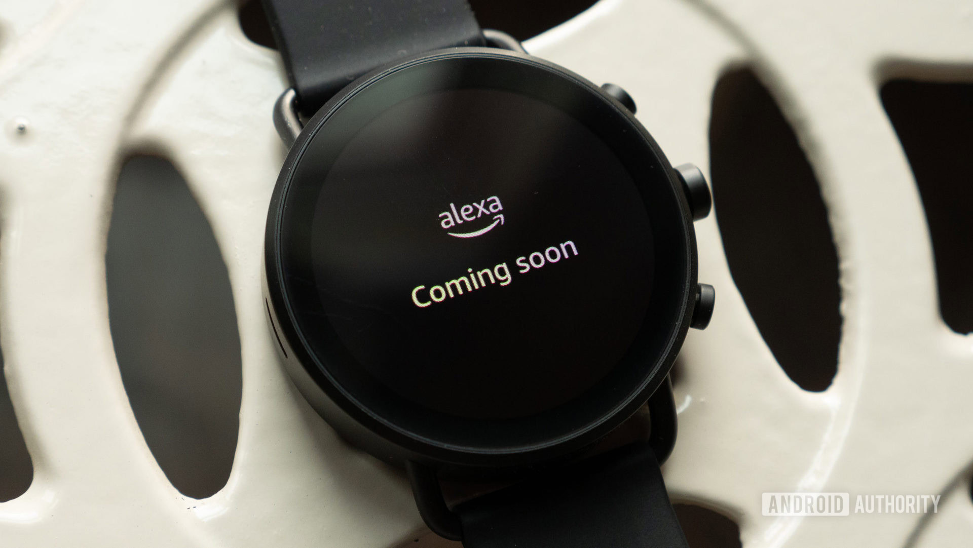 An image of the SKAGEN Falster Gen 6 on a table showing Amazon Alexa voice assistant coming soon to select Wear OS devices.