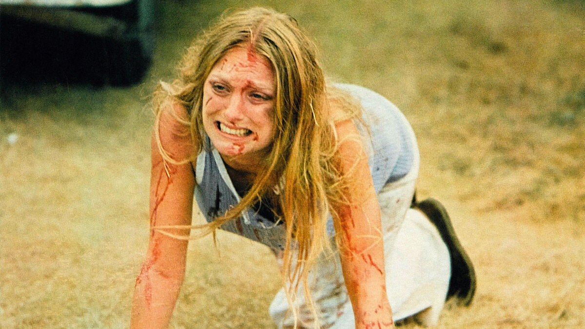 Sally crawling to safety in Texas Chain Saw Massacre - best movies on Shudder