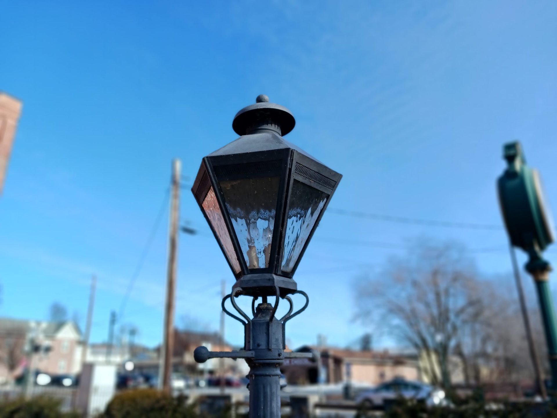 galaxy a13 portrait old-fashioned lamp post against a blue sky