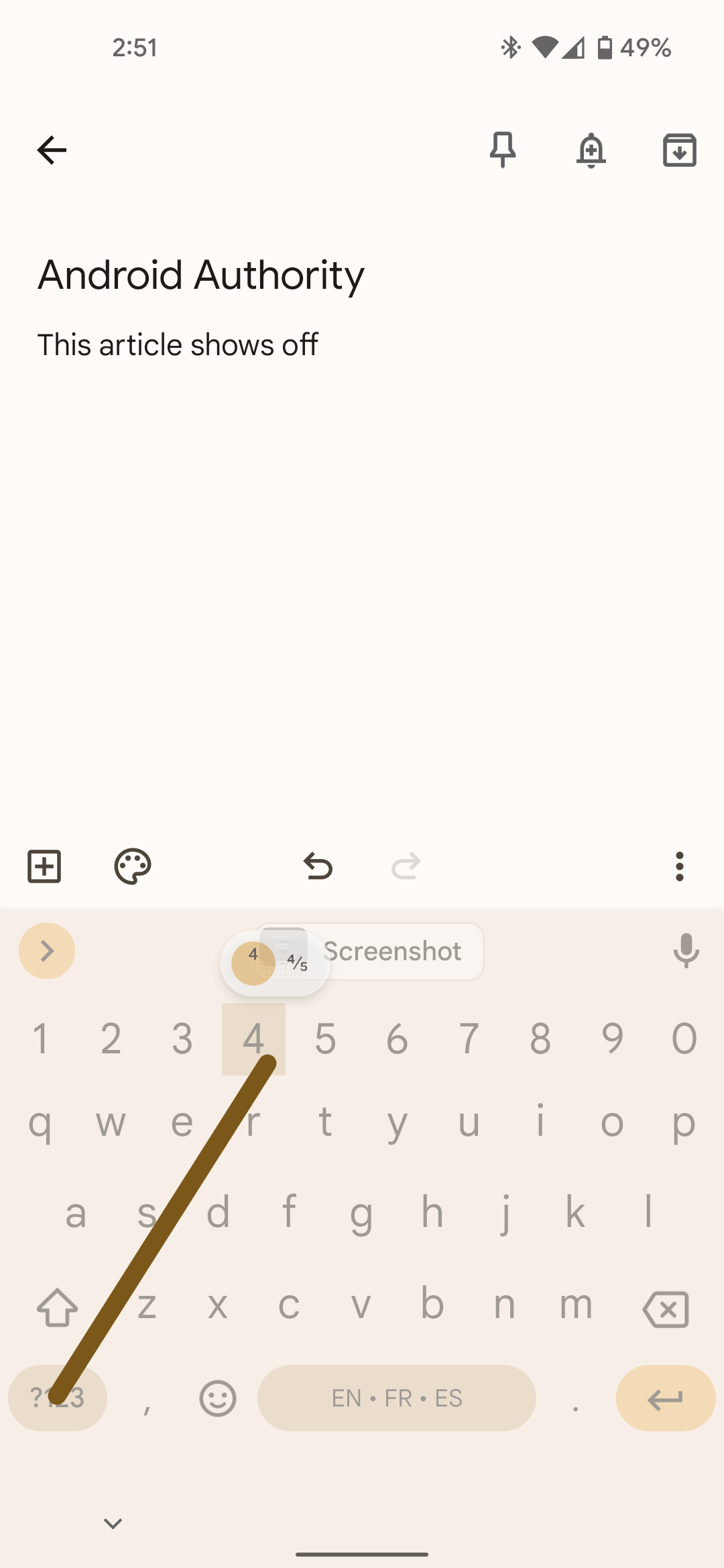 Gboard showing gesture to quickly insert a symbol