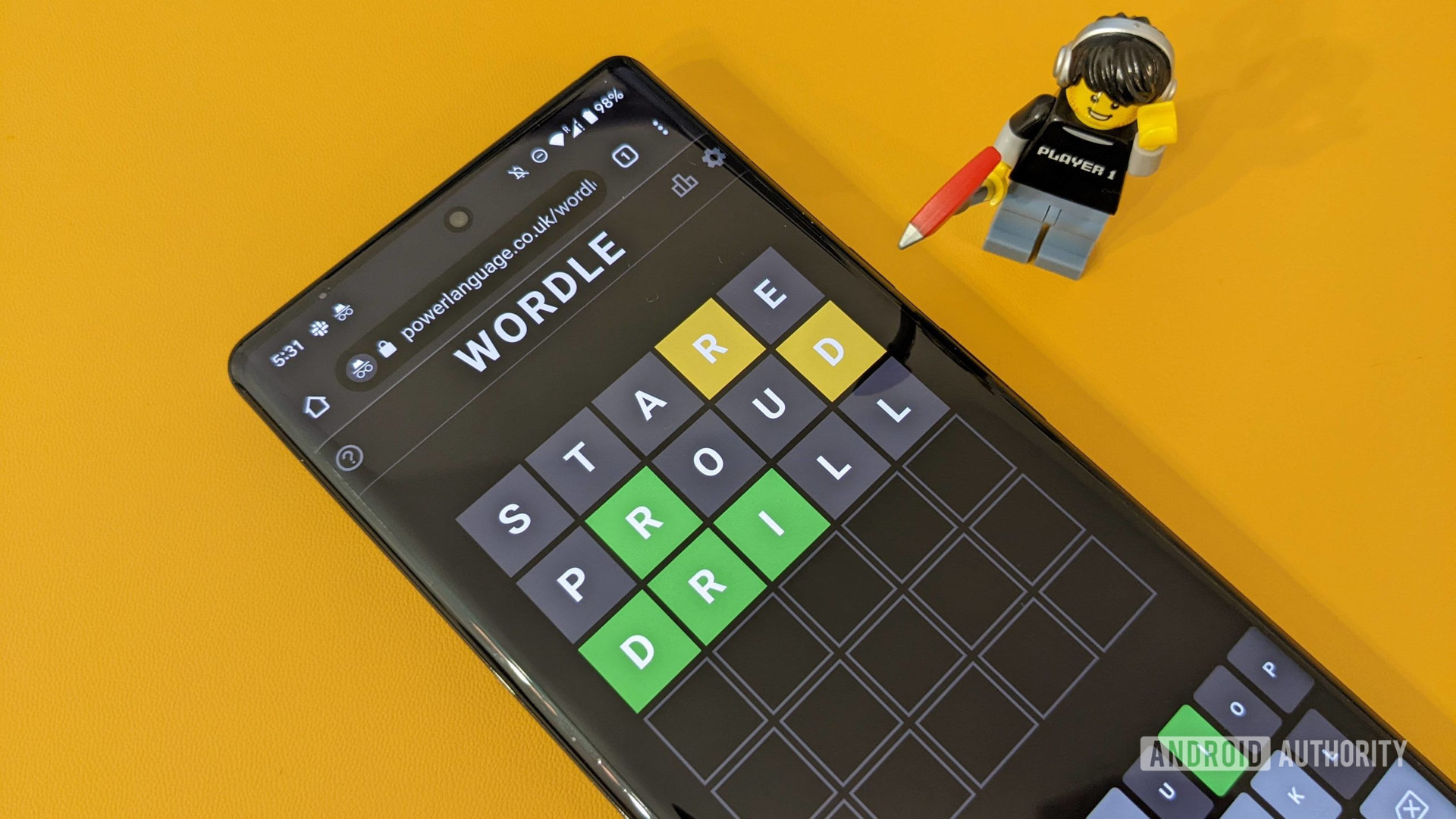 Wordle game screenshot running on a Pixel 6 Pro with a lego player character