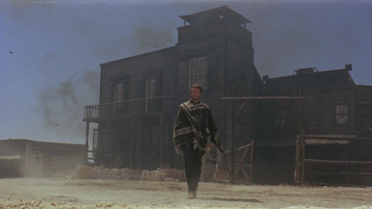 Clint Eastwood approaches, primed for a standoff, in A Fistful of Dollars - best new streaming movies
