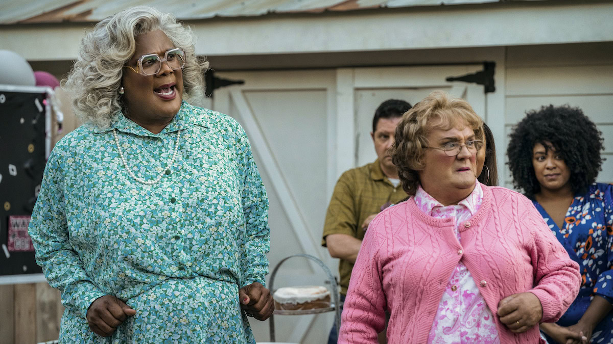 Madea and Agnes stand together at an outside gathering in A Madea Homecoming