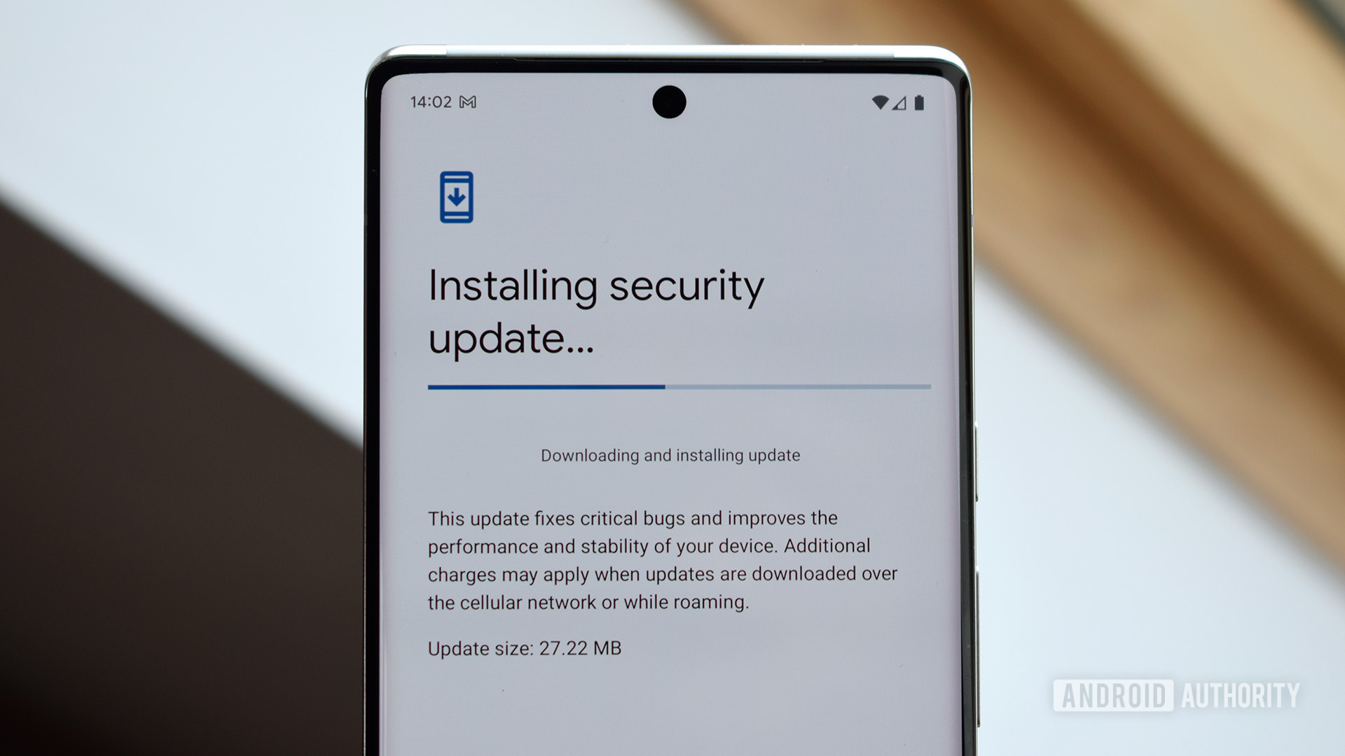 A security update installing on a phone.