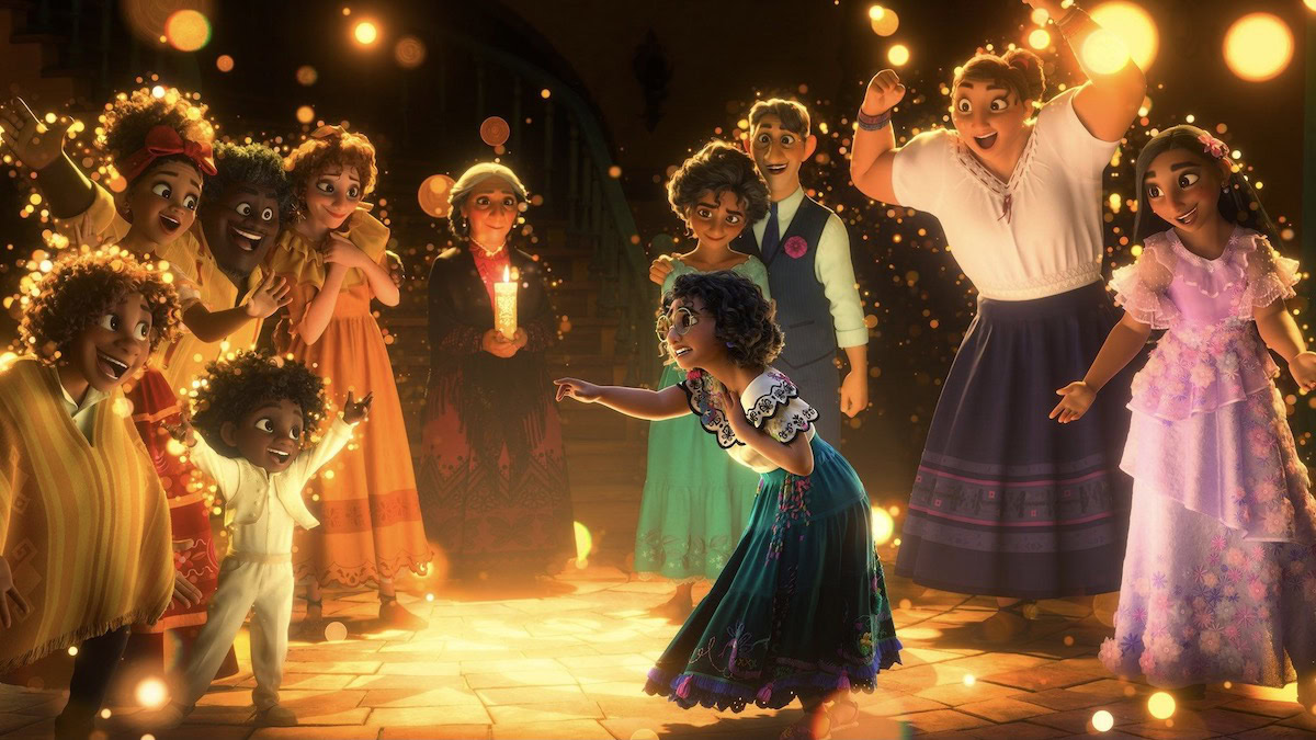 Encanto scene in which the main characters stand together surrounded by magical light