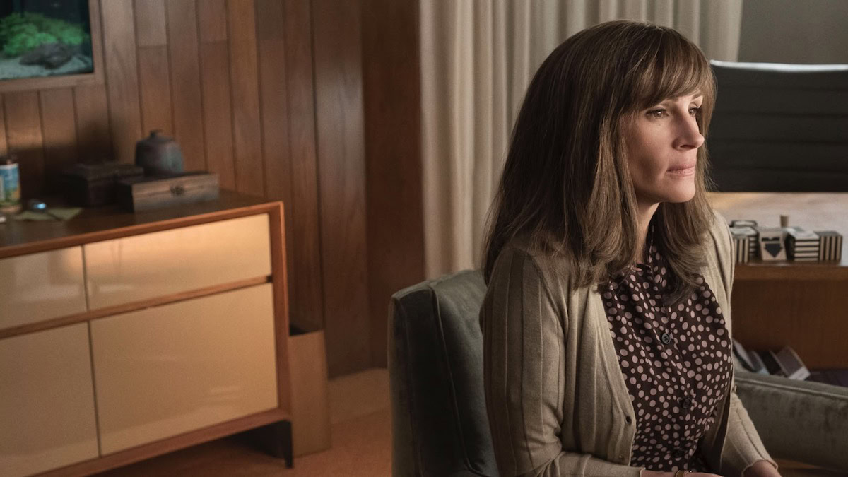 Julia Roberts sits at her desk in Homecoming - shows like archive 81