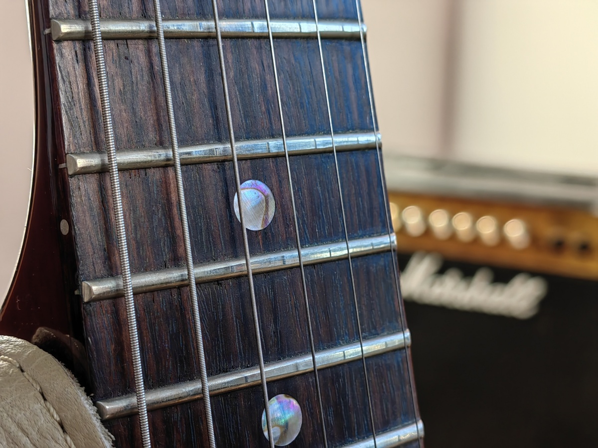 Huawei 50 Pro camera sample guitar strings and frets close up